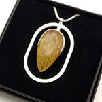 Rutilated quartz pendant